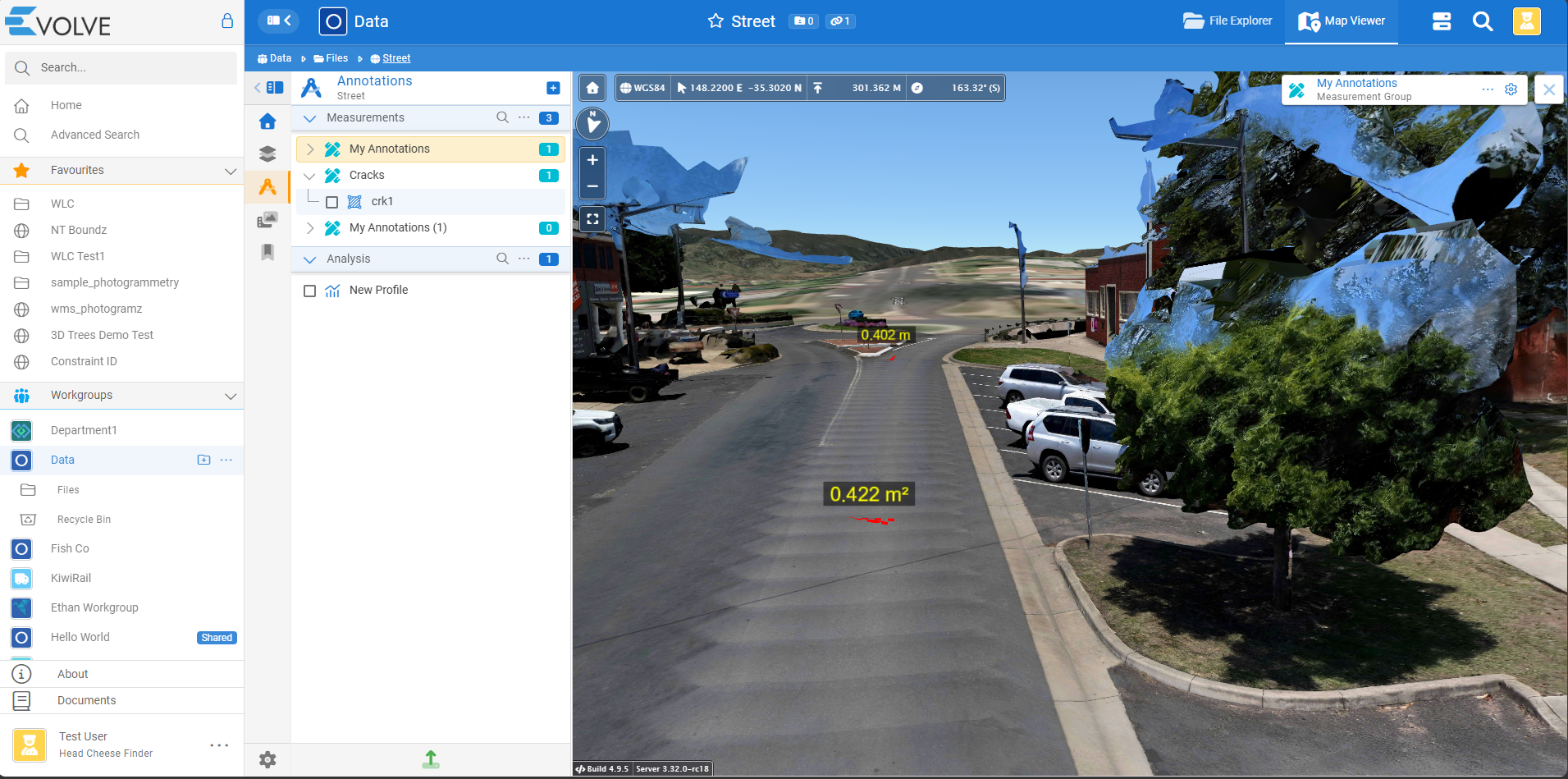GMS Map Viewer showing a 3D street point cloud with crack annotations and distance and area measurements overlaid on the road surface